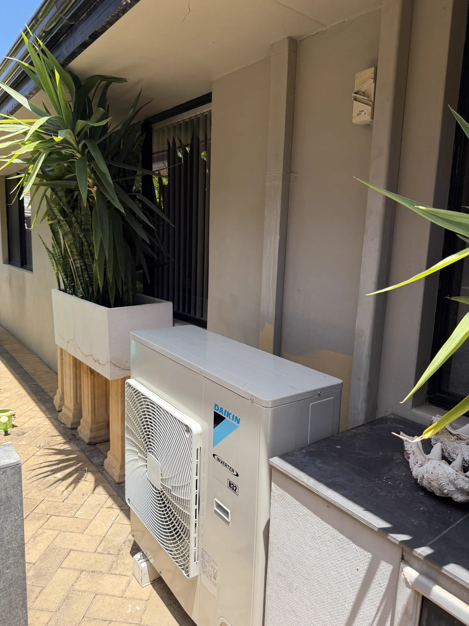 Daikin split system outdoor unit installed at a Perth home by Calabreeze